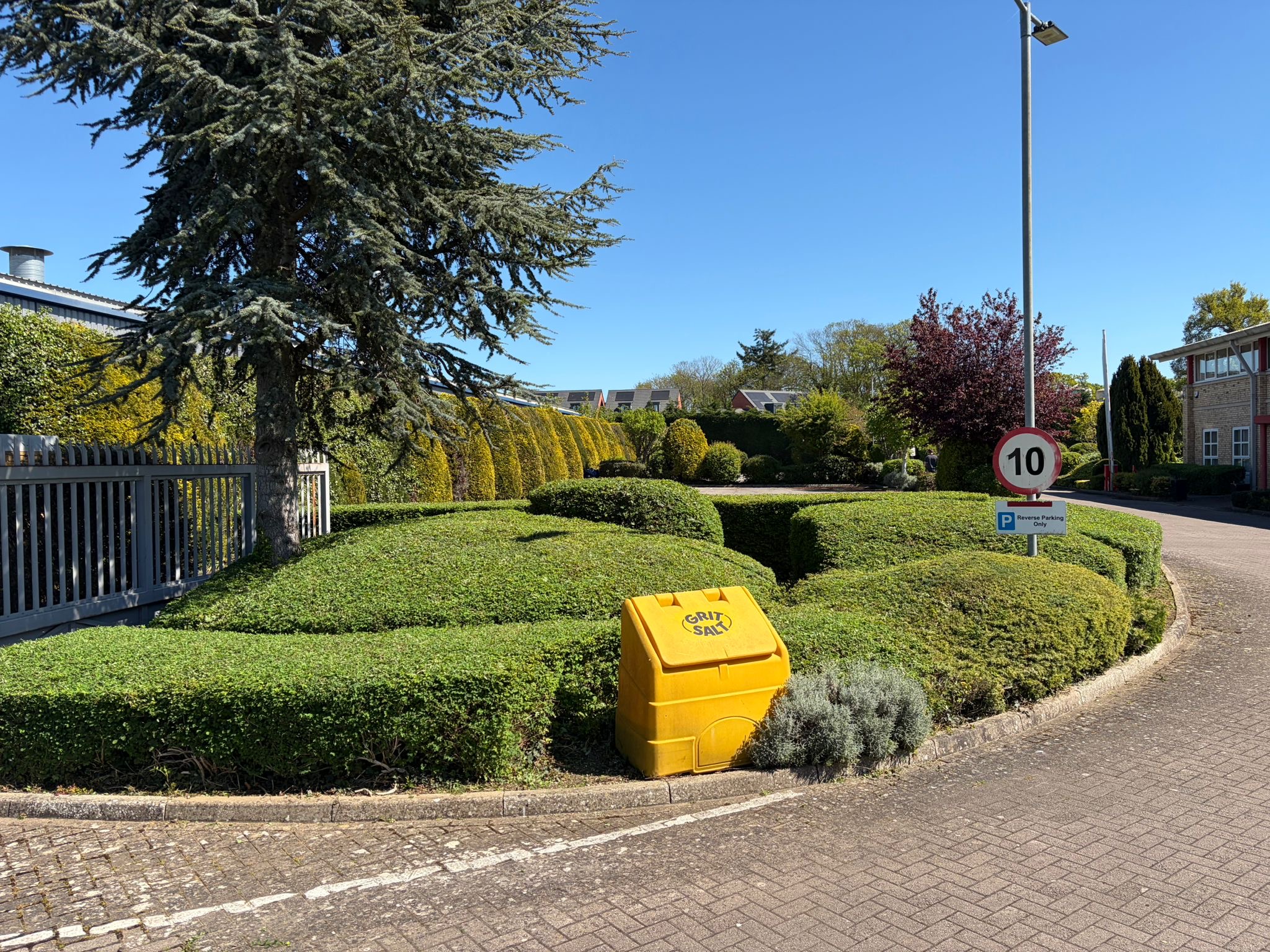 Hedge trimming at a commercial site